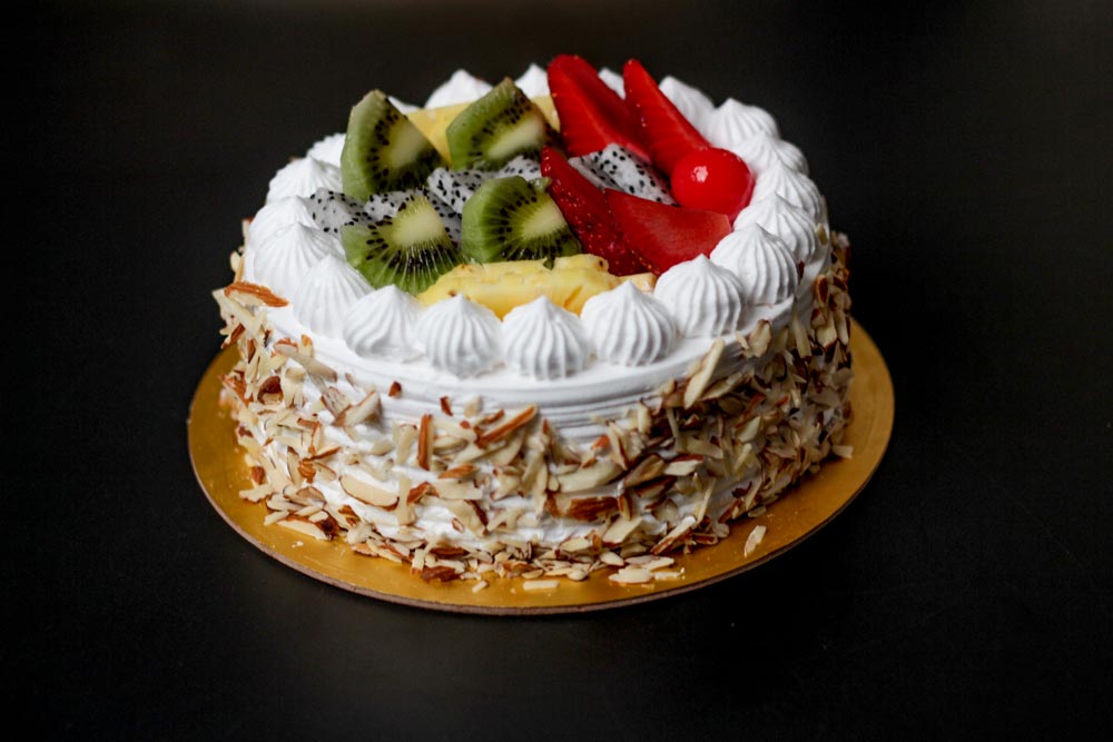 Order Butterscotch Heart Shape Fruit Cake Online - IndiaGiftsKart