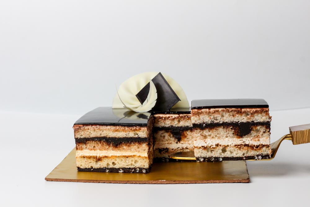 Citrus Layered Opera Cake with Chocolate Ganache and Hazelnuts Stock Image  - Image of french, citrus: 142346459