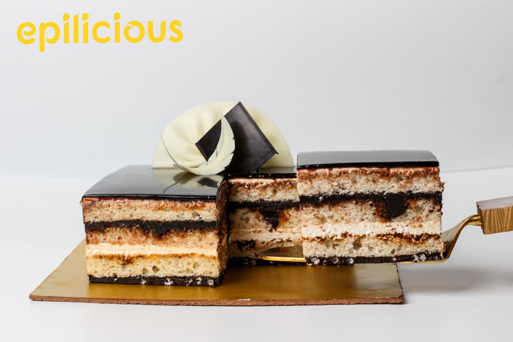 Common Bond - The Opera Cake! This Gluten-free dessert made of an almond  egg white cake, French 56% cocoa ganache, creamy coffee buttercream, and  chocolate glacage was designed by world-renowned Chef, Gaston